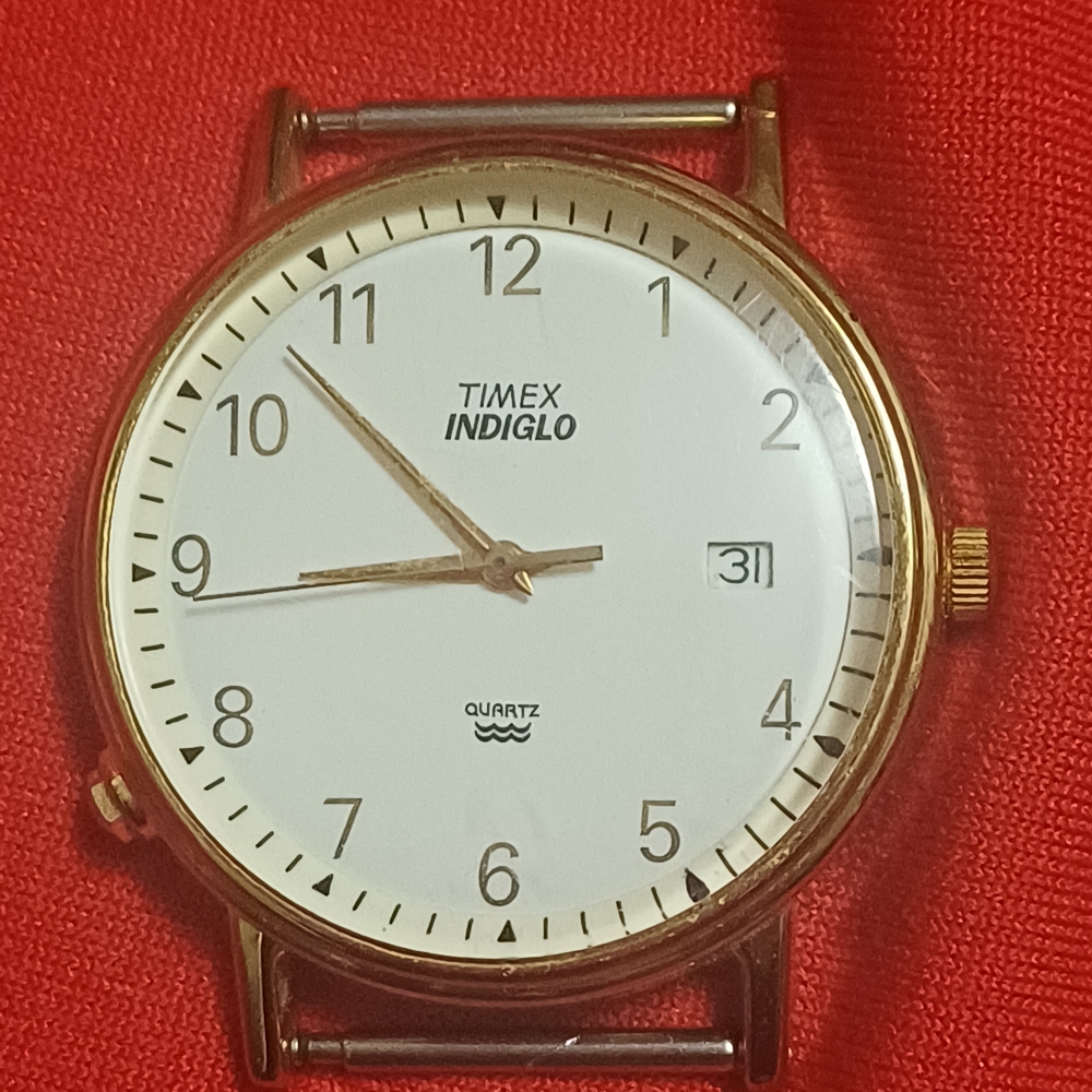 Timex Indiglo White and Gold Watch